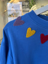 SUDADERA AZUL CORAZONES BORDADOS