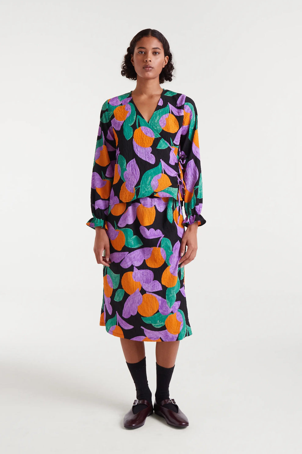 FALDA MIDI BÁMBULA NARANJAS LILA